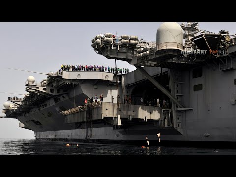 How many people live on an aircraft carrier